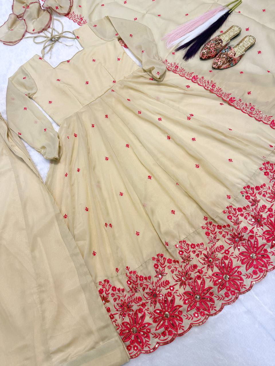 Exquisite Beige Flared Anarkali Suit Set Adorned with Vibrant Red Floral Embroidery, Sequined Scalloped Hem, and an Elegant Tie-Up Back